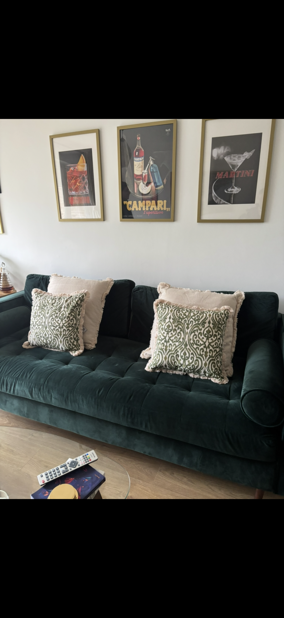 Dark green velvet sofa
