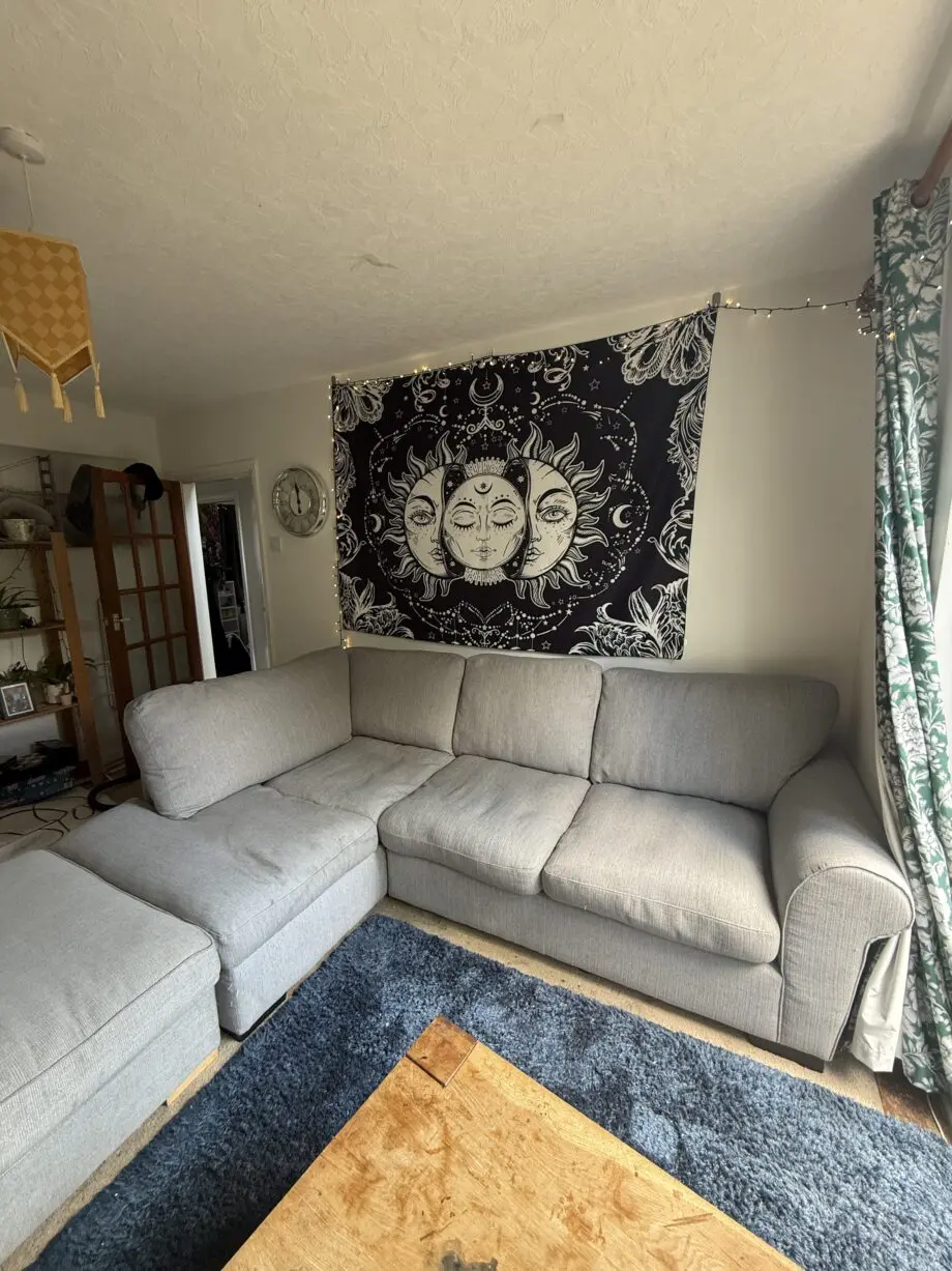 Grey corner sofa + footstool