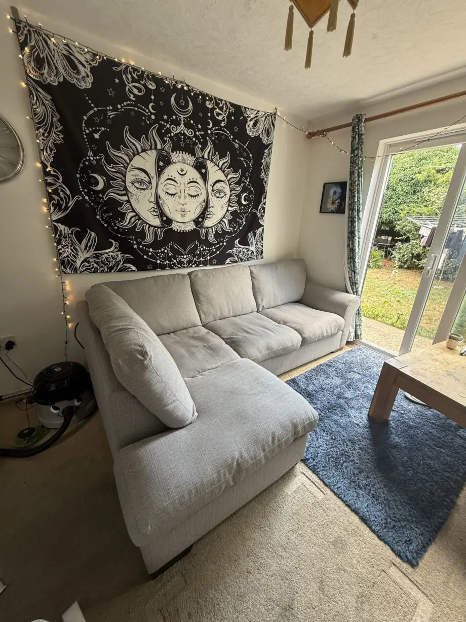 Grey corner sofa + footstool