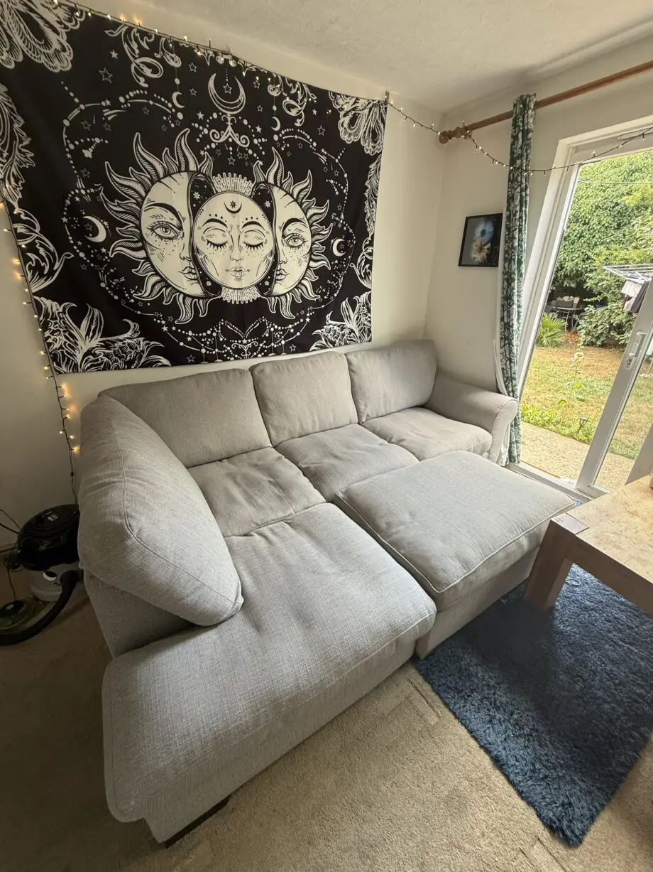 Grey corner sofa + footstool