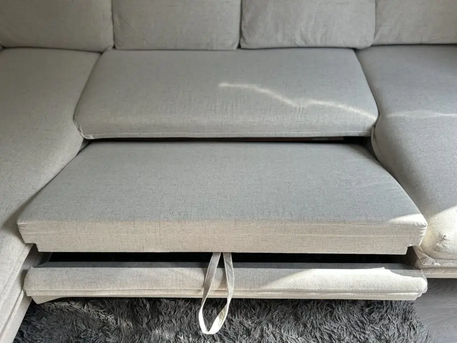 Charming Charlie Beige Upholstered Corner Sofa Bed with Storage