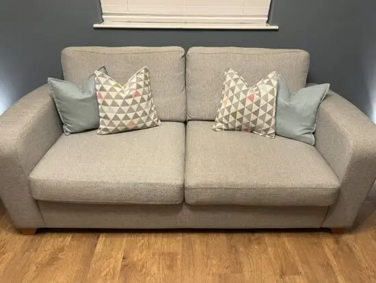 Hardly used sofa and foot stall with storage