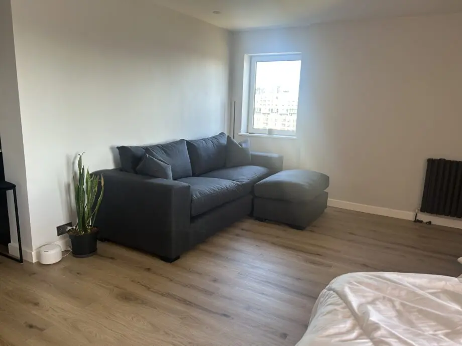 Raft anthracite linen Melrose bespoke sofa with footstool