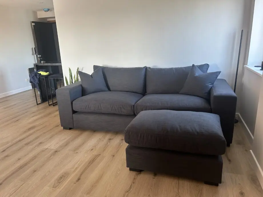 Raft anthracite linen Melrose bespoke sofa with footstool
