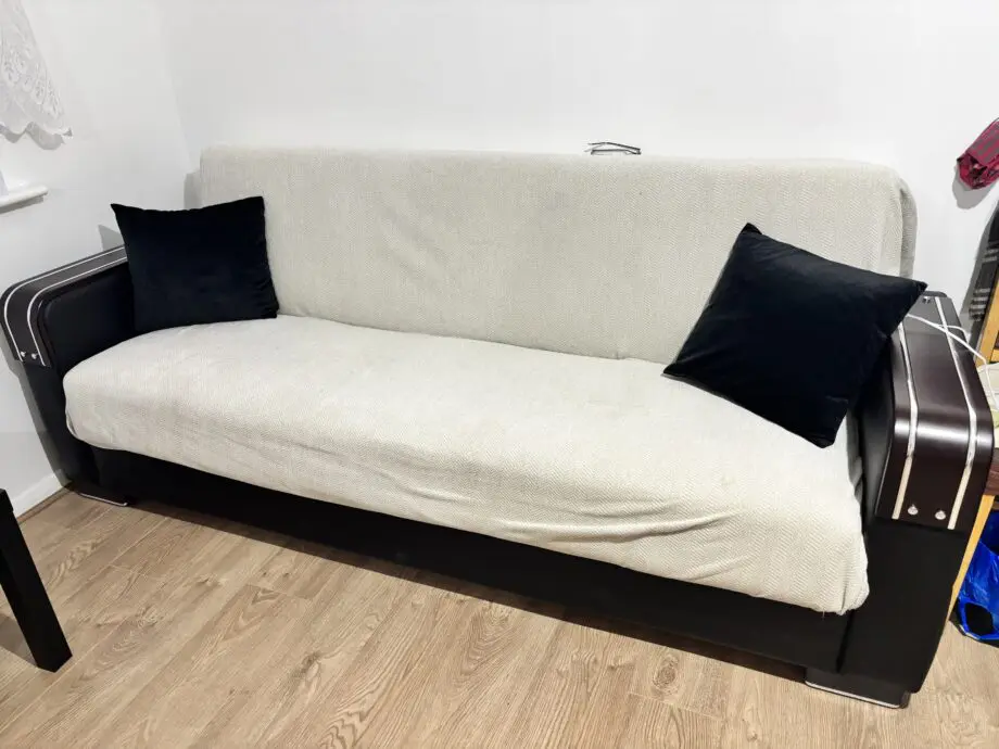 2 brand new 3 seater black Sofa beds
