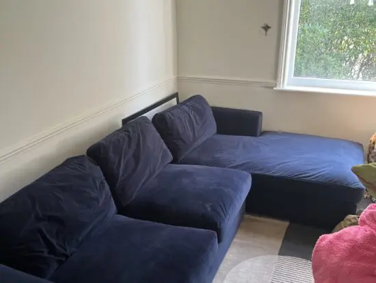 Furniture123 Blue velvet sofa with chaise