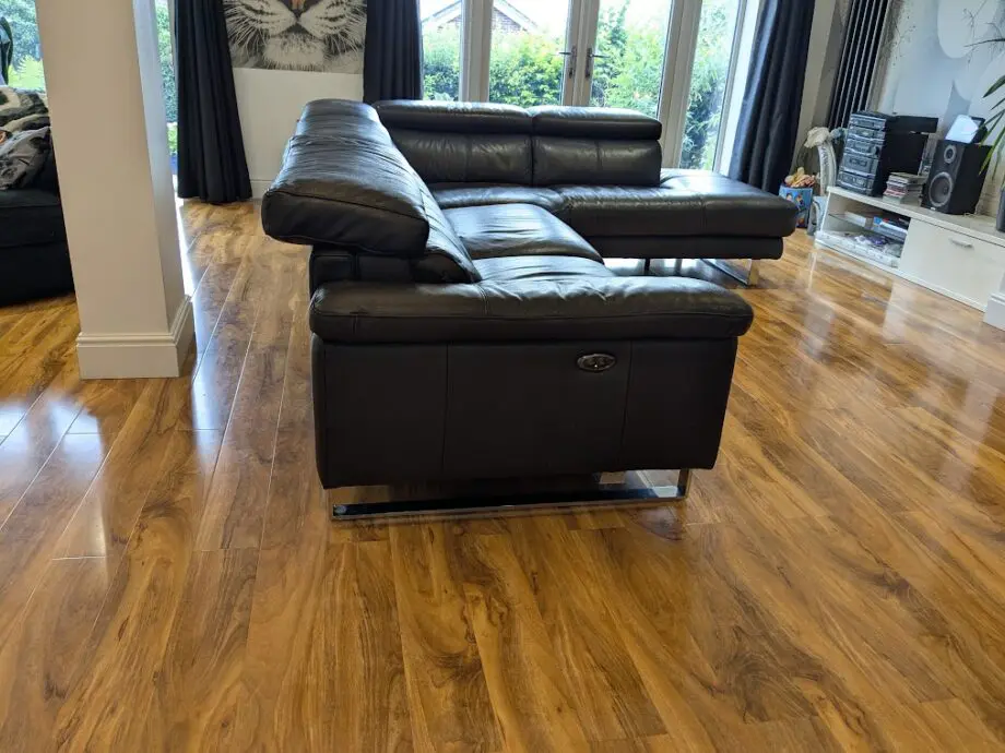 DFS, Black Leather corner sofa, great condition. Adjustable head restraints, electric wide footrestlegs.