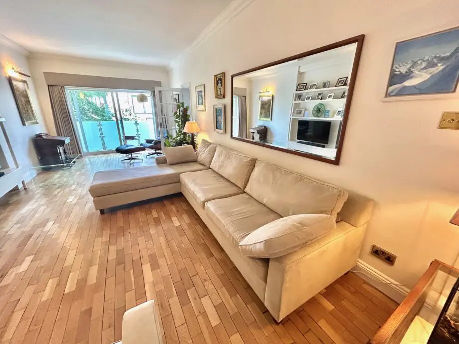 large L-shaped Wesley Barrell natural Alcantara sofa and matching armchair