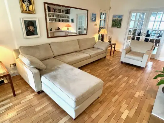 large L-shaped Wesley Barrell natural Alcantara sofa and matching armchair