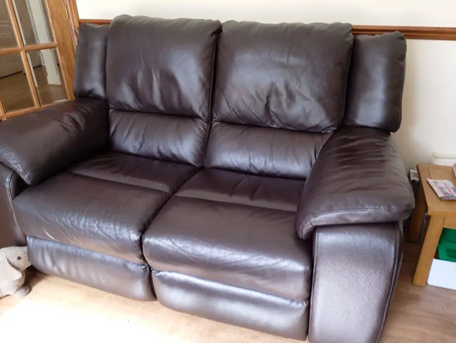 Harvey's dark brown Italian leather reclining sofas x 2