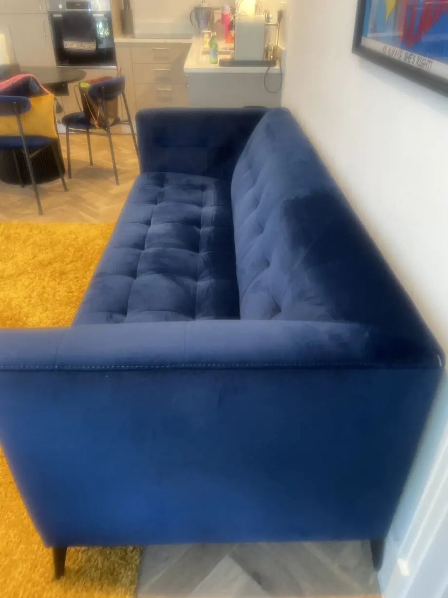 Navy blue velvet solid button back sofa one careful owner no pets smoking