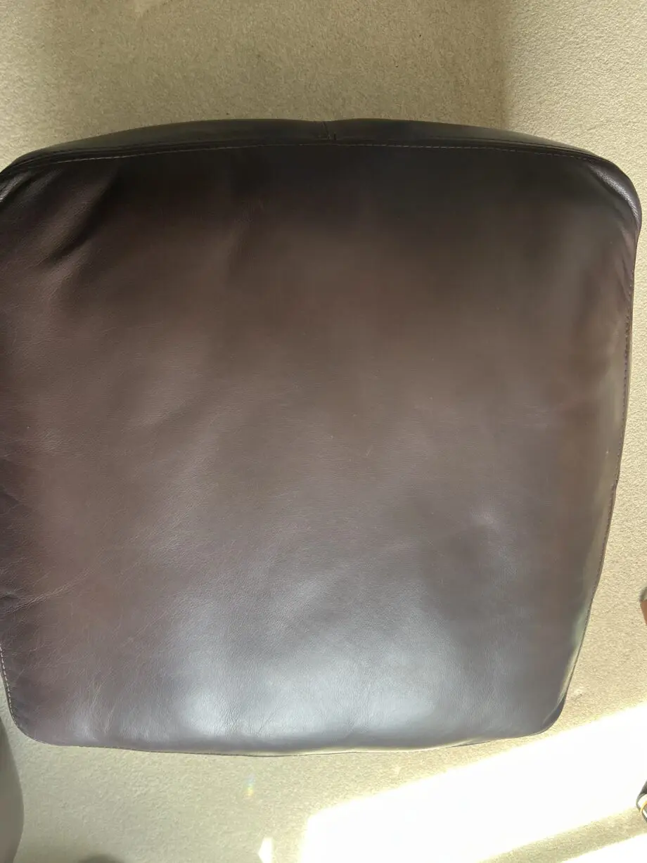 Brown leather 2 seater and matching footstool