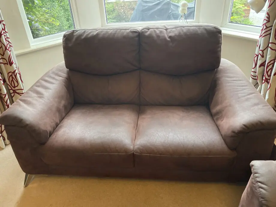 Sofology chocolate brown moleskin 2 and 3. Seater sofas plus a convertible footstool/ additional seat