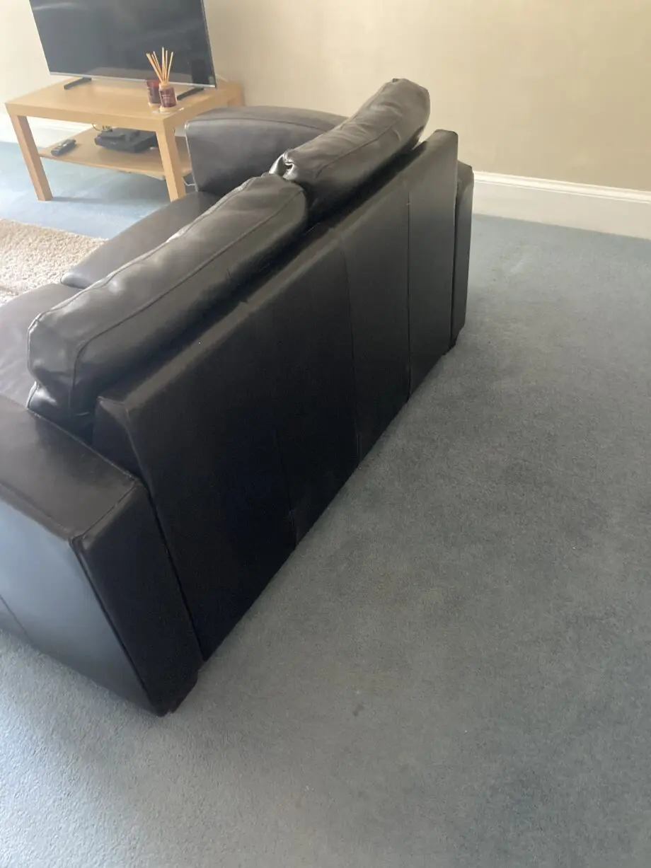 Very dark brown leather two seater matching sofas