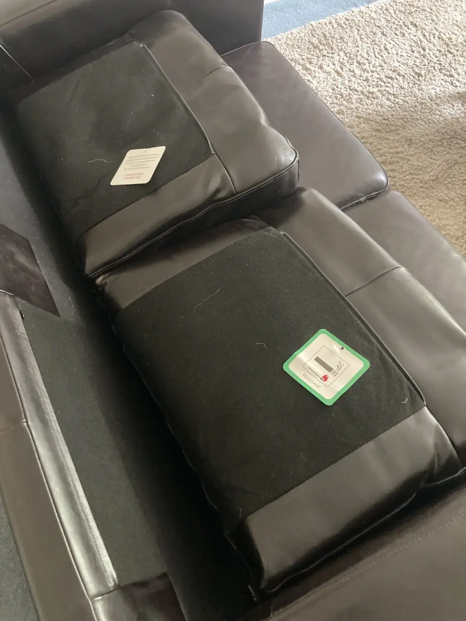 Very dark brown leather two seater matching sofas