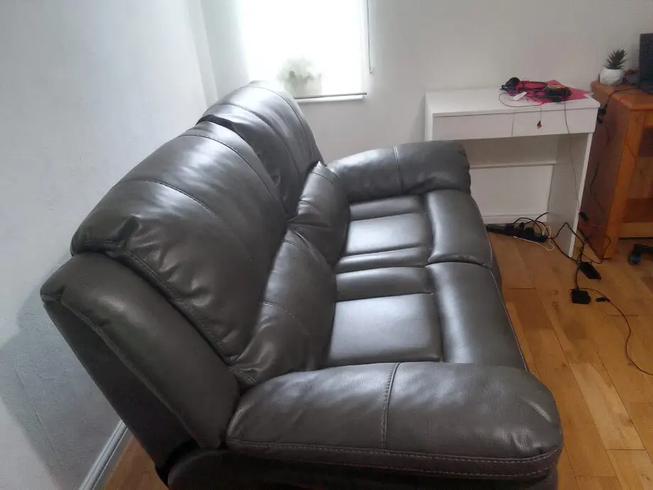 Dark grey leather 2 seater recliner sofar
