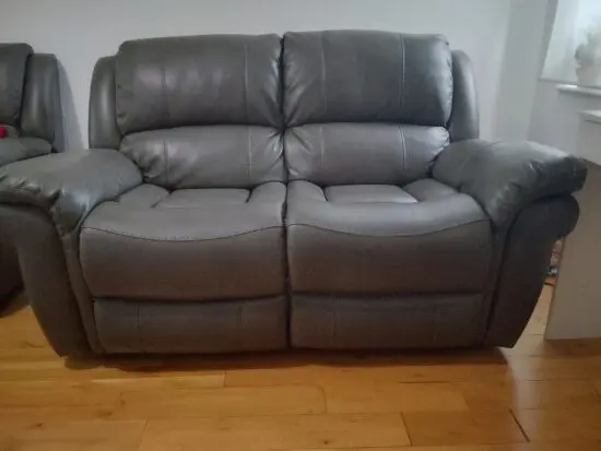 Dark grey leather 2 seater recliner sofar