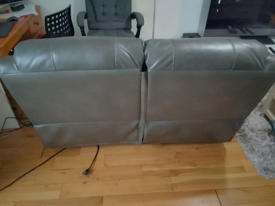 Dark grey leather 2 seater recliner sofar