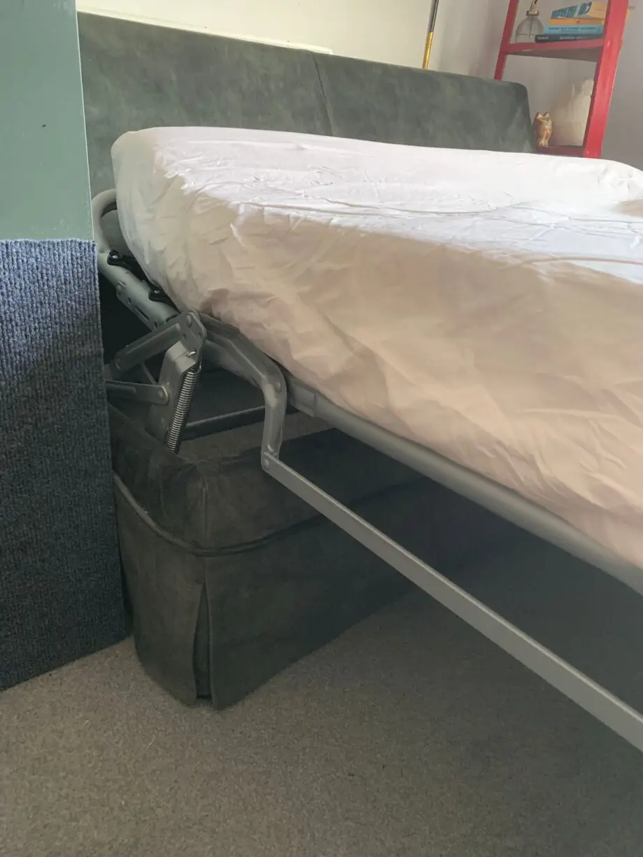 Emerald green two seater sofa bed