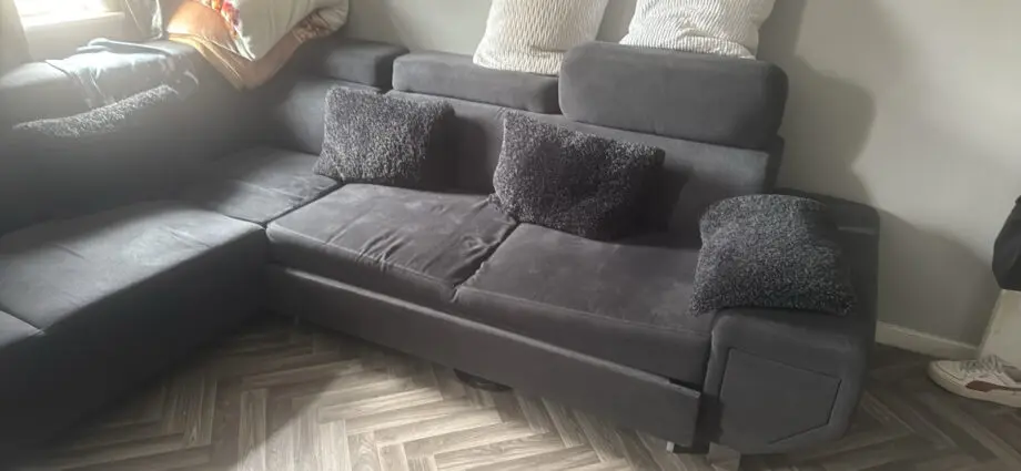 Grey L shape sofa bed