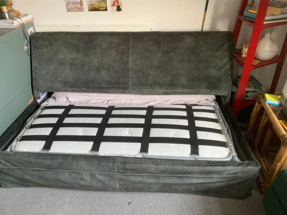 Emerald green two seater sofa bed