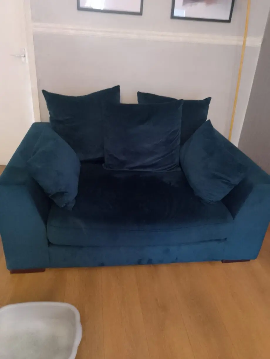 DFS blue velvet right hand chaise sofa and blue matching snuggle chair