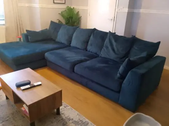 DFS blue velvet right hand chaise sofa and blue matching snuggle chair