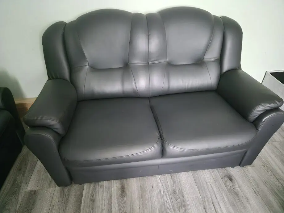 Black leather look 2 and 3 seater sofa