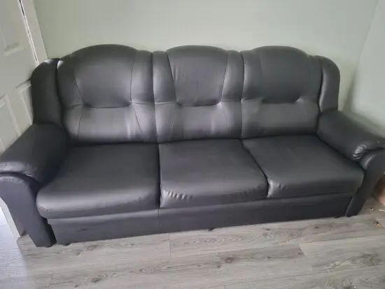 Black leather look 2 and 3 seater sofa
