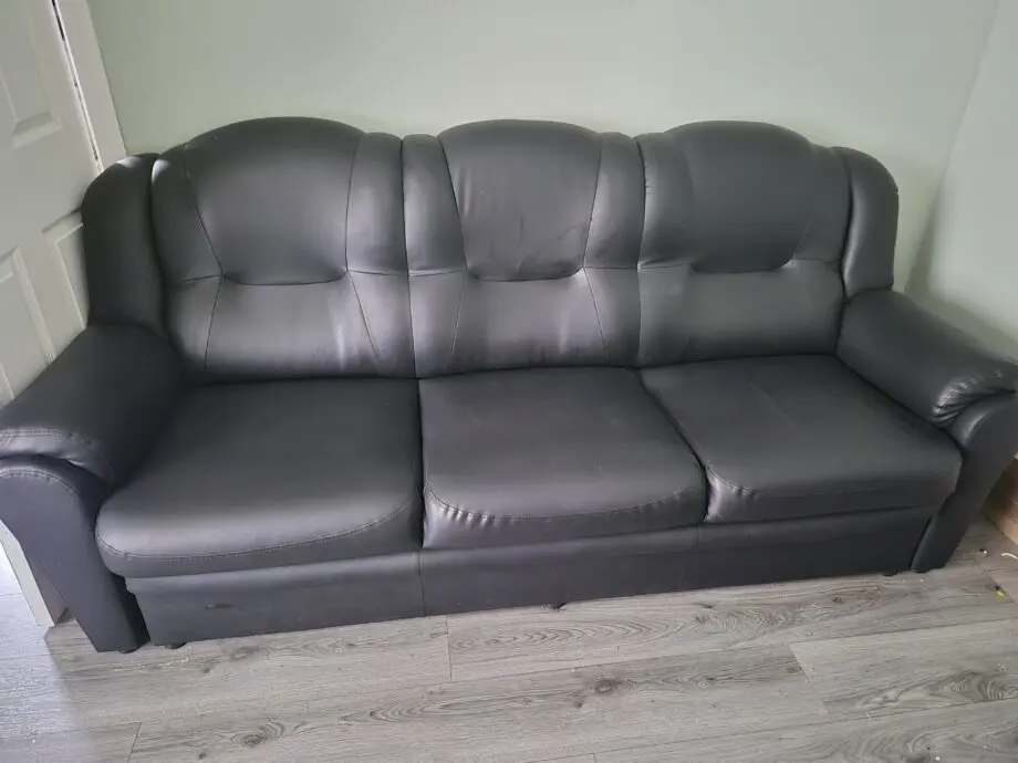 Black leather look 2 and 3 seater sofa