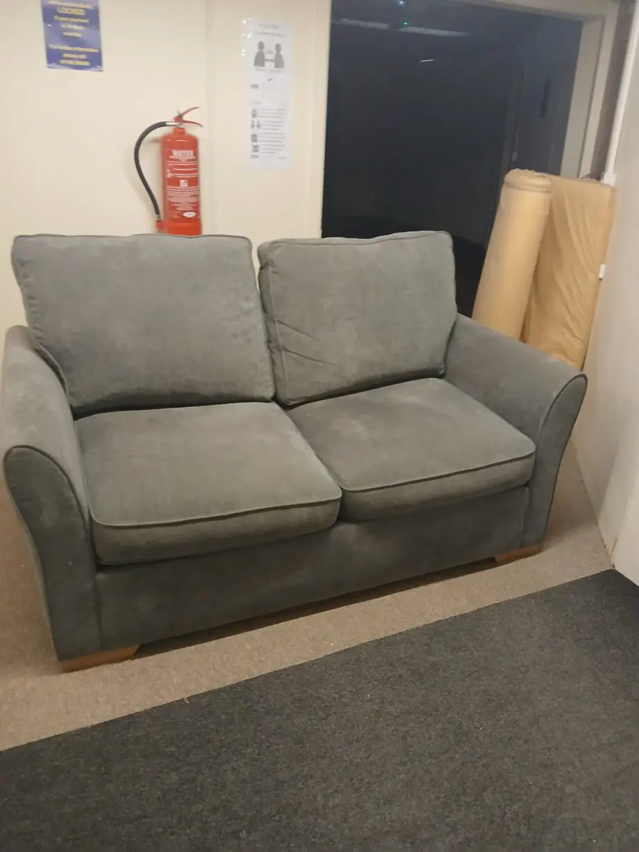 Nice firm 2 seater Sofa in Grey, cushions to match