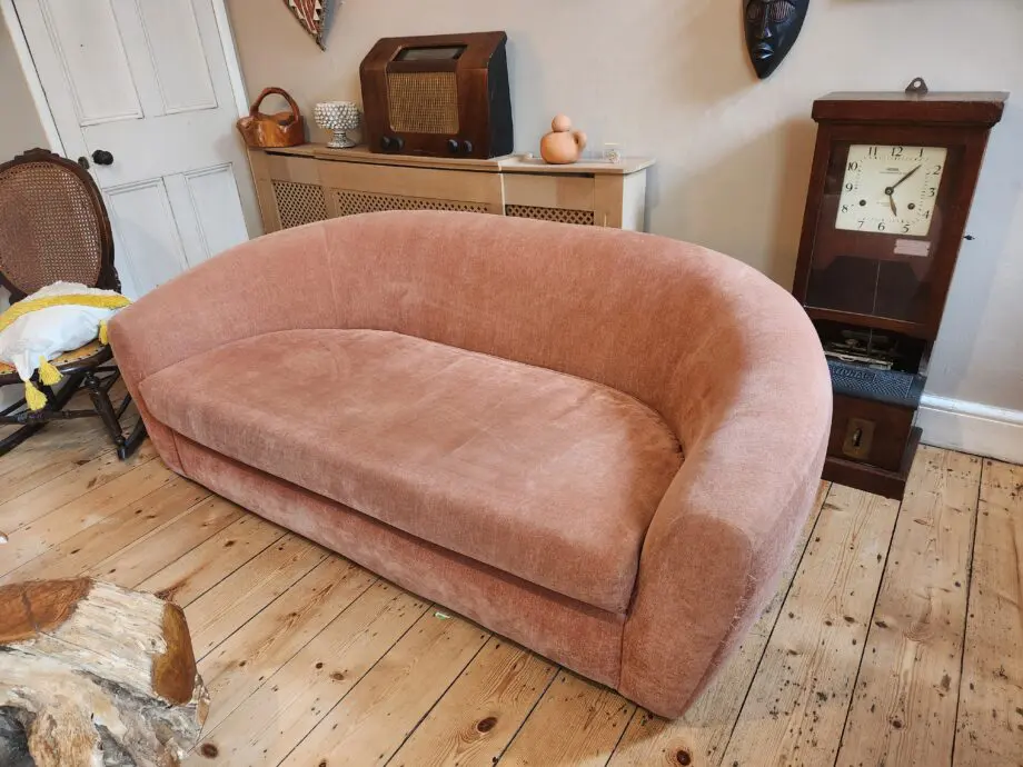 Beautiful modern soft salmon 3 seater sofa
