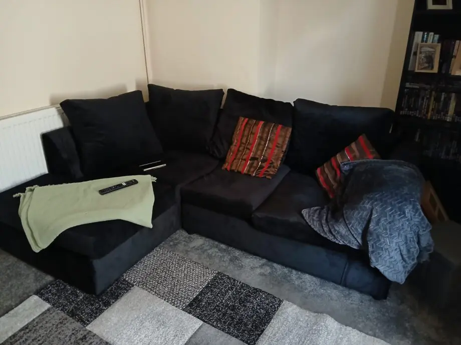 Brand new black corner sofa