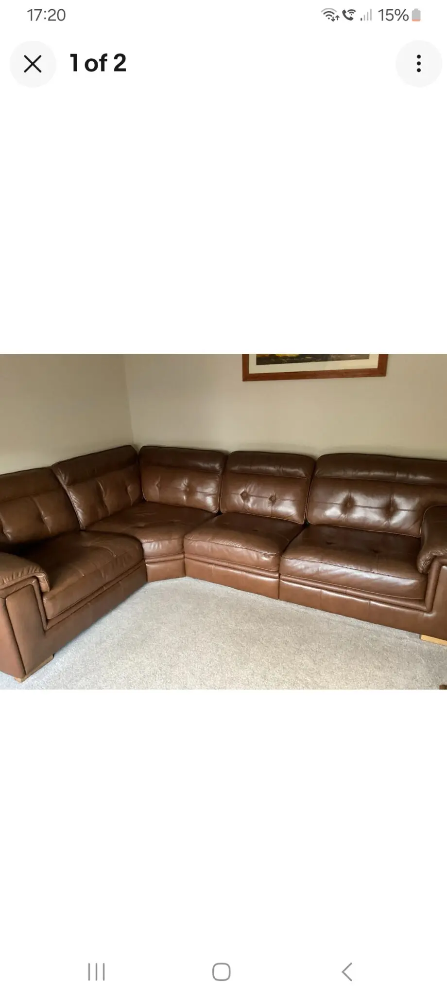 DFS deep brown leather corner sofa.