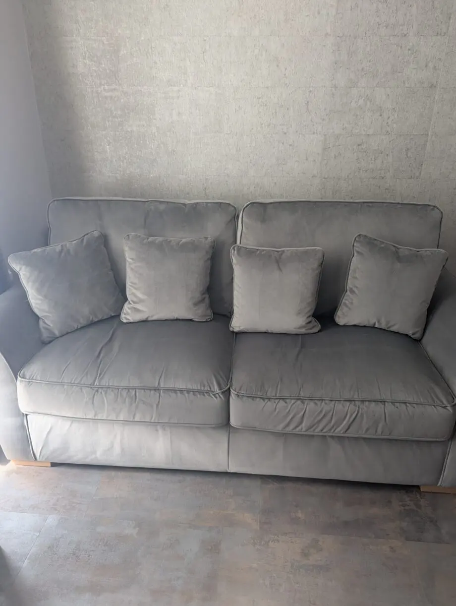 Furniture World, Fantasy range, 3 seater sofa with love chair and footstool in Festival Grey colour, velvet material. Comes with 4 pillows.