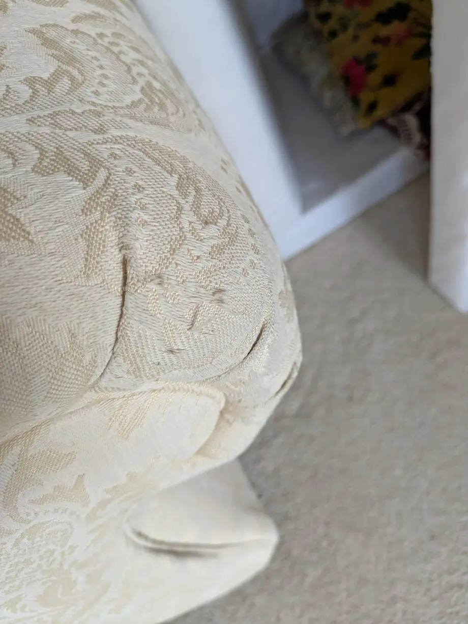 Stylish and comfortable cream sofa in good condition