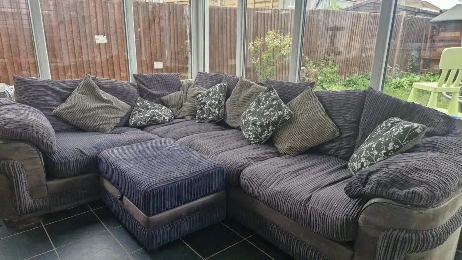 DFS black fabric corner sofa bed