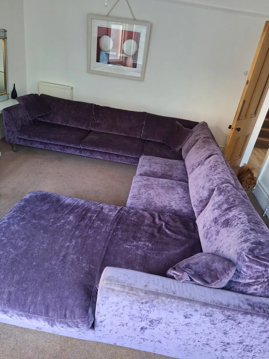 Stocktons steel framed dark purple U shaped settee one side i