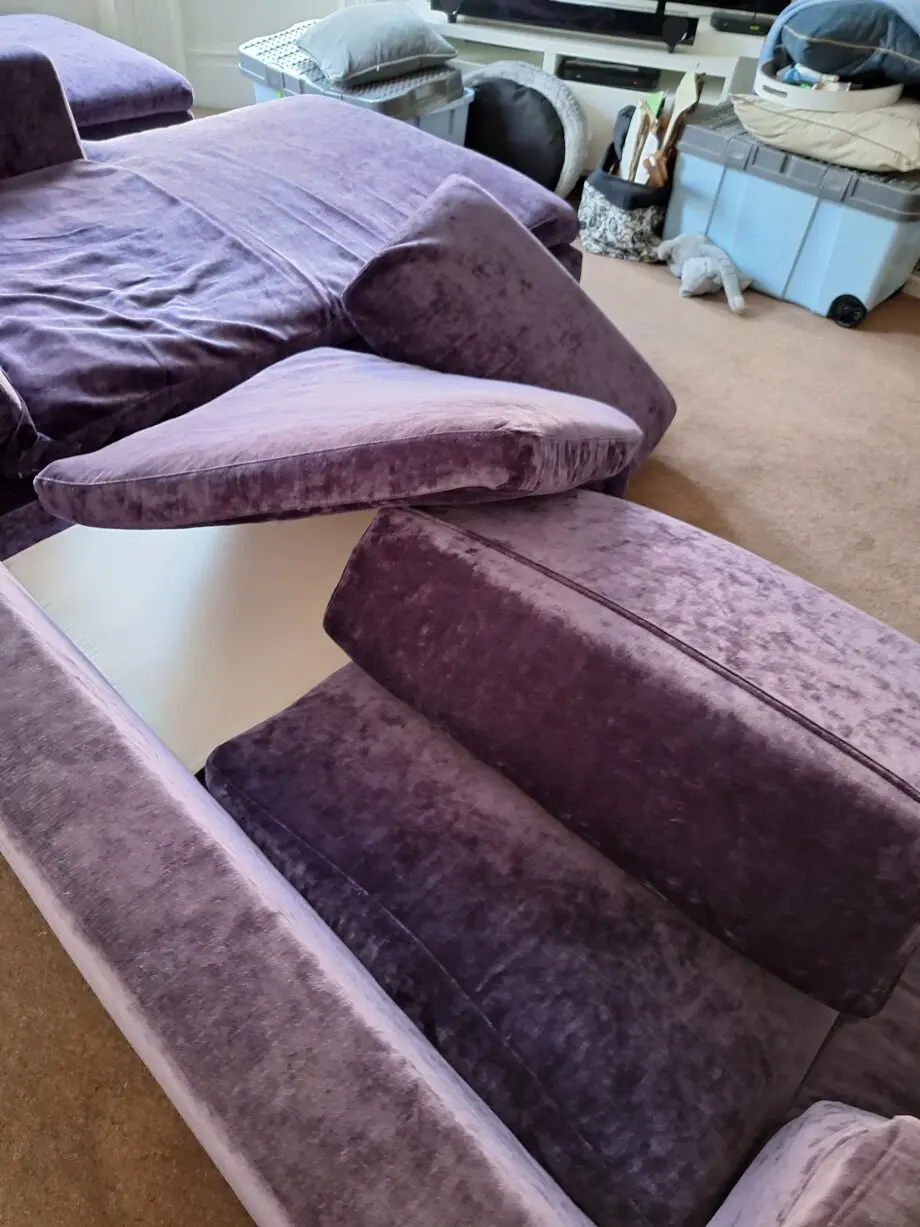 Stocktons steel framed dark purple U shaped settee one side i