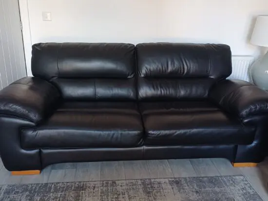 3 seat black leather sofa