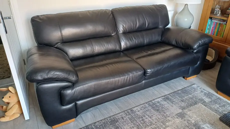 3 seat black leather sofa