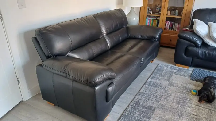 3 seat black leather sofa