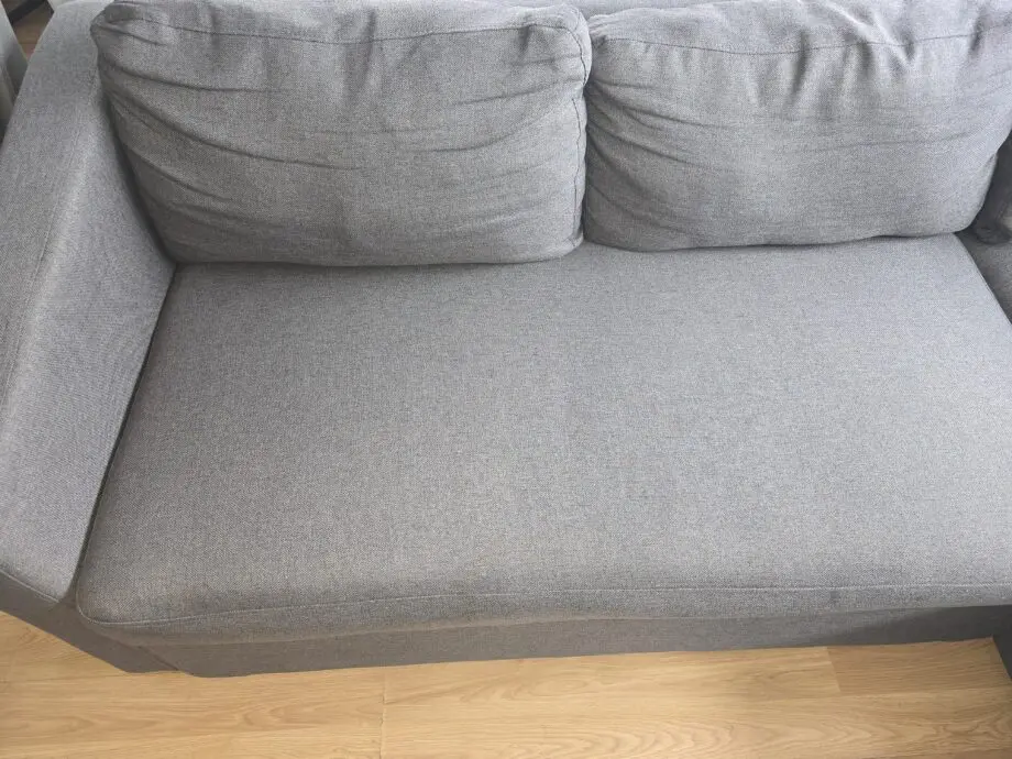 Dark grey L shape sofa bed with storage