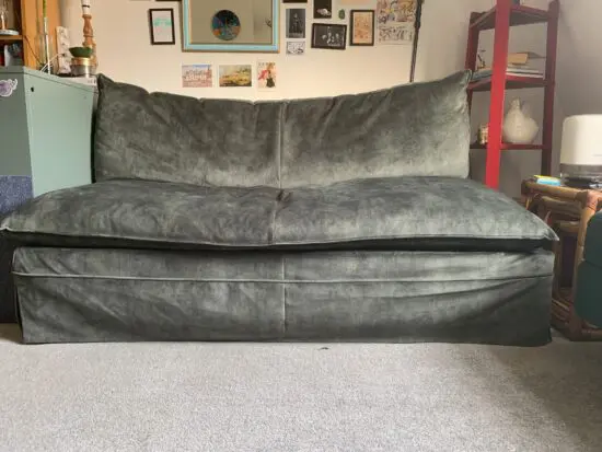 Emerald green two seater sofa bed
