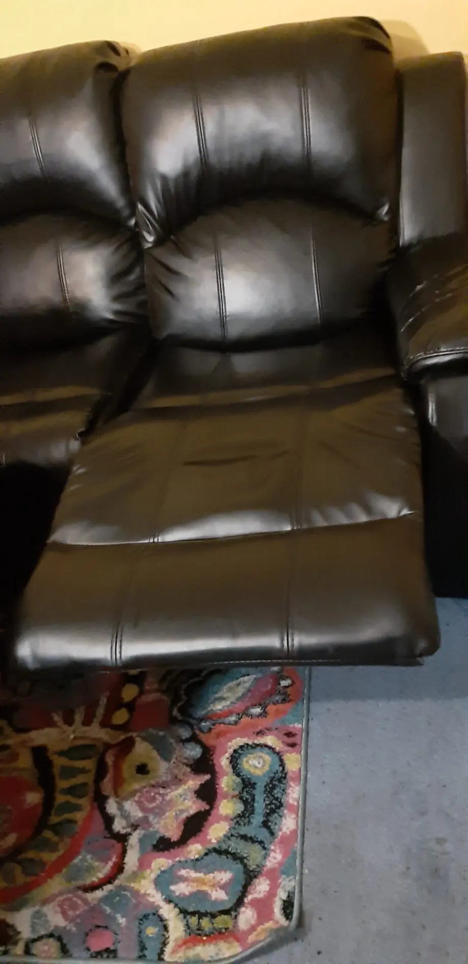 Black faux leather leg recliner Settee.