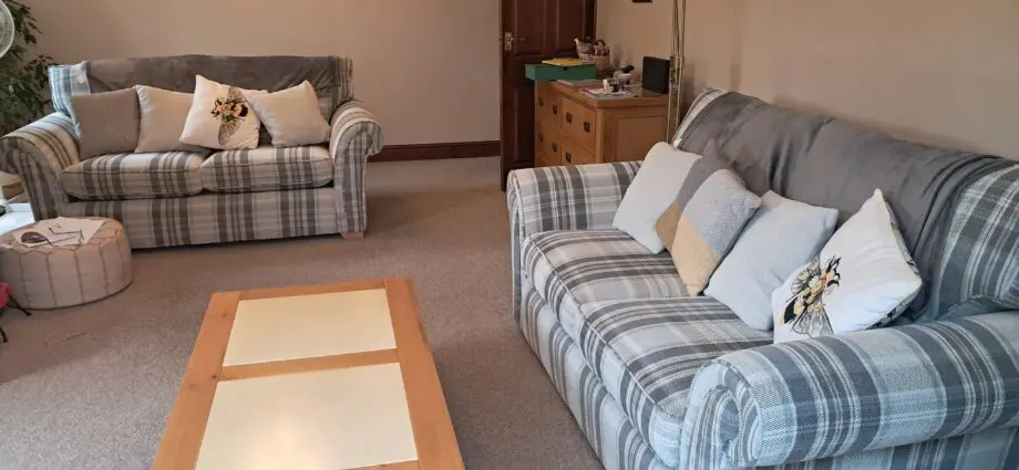 Pair of Grey 2 seater sofas, identical in Lawrence design from Aldiss in Fakenham