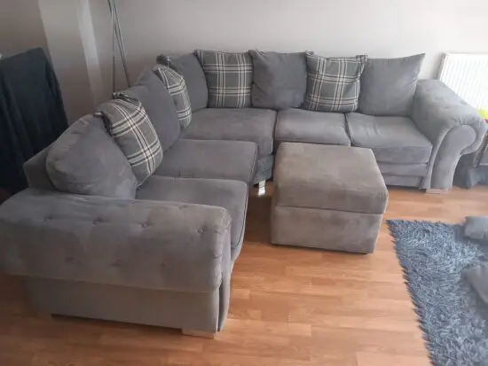 Large grey cornet sofa 240cm x 240cm comes with footstool