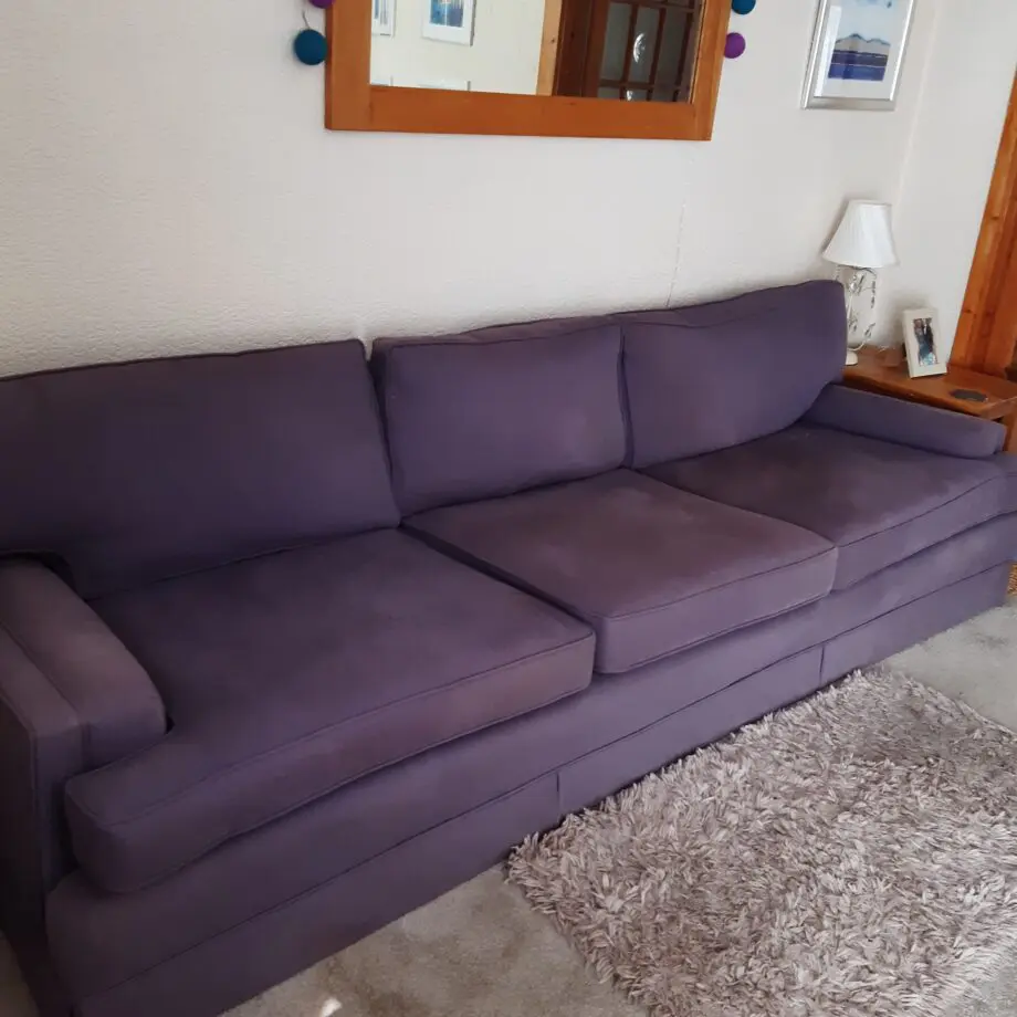 very elegant four seater sofa soft Damson colour