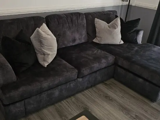 DFS Velvet 4 Seater Lounger in Charcoal with foot stool