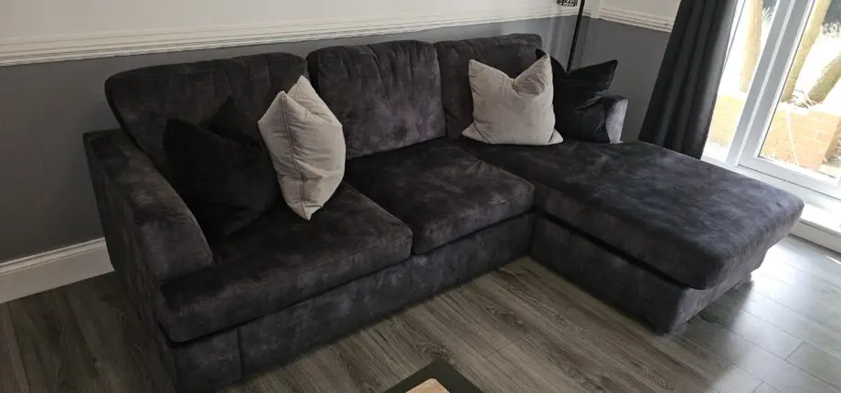 DFS Velvet 4 Seater Lounger in Charcoal with foot stool